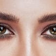 Female Eye with Extreme Long False Eyelashes. Eyelash Extensions. Makeup, Cosmetics, Beauty. Close up, Macro